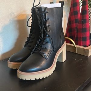 Brand new never worn black heeled booties